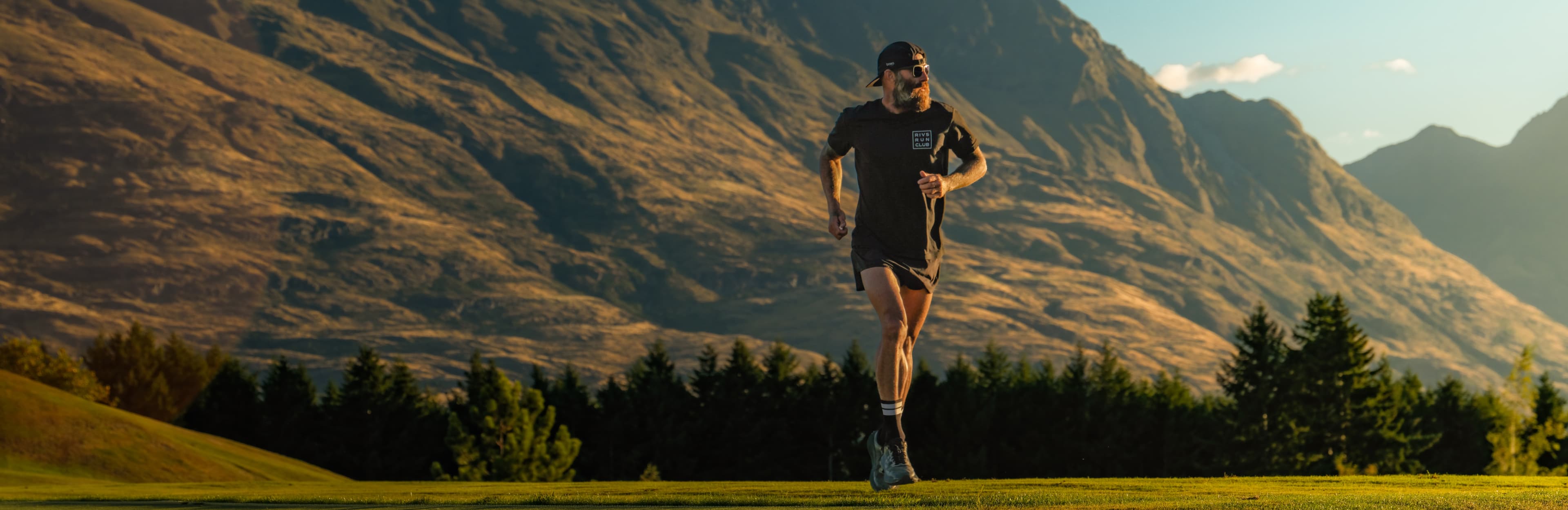 Tommy Rivs leads the New Zealand season of Rivs Run Club on iFIT, running through open valley terrain beneath dramatic Southern Alps mountain scenery.